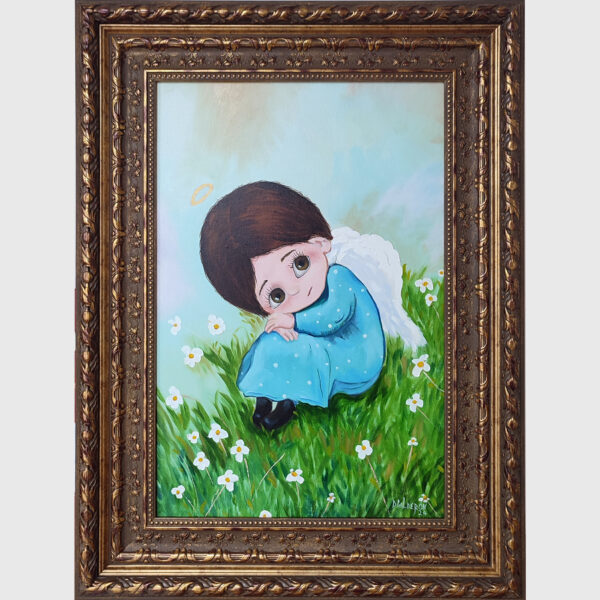 Angel en el pasto